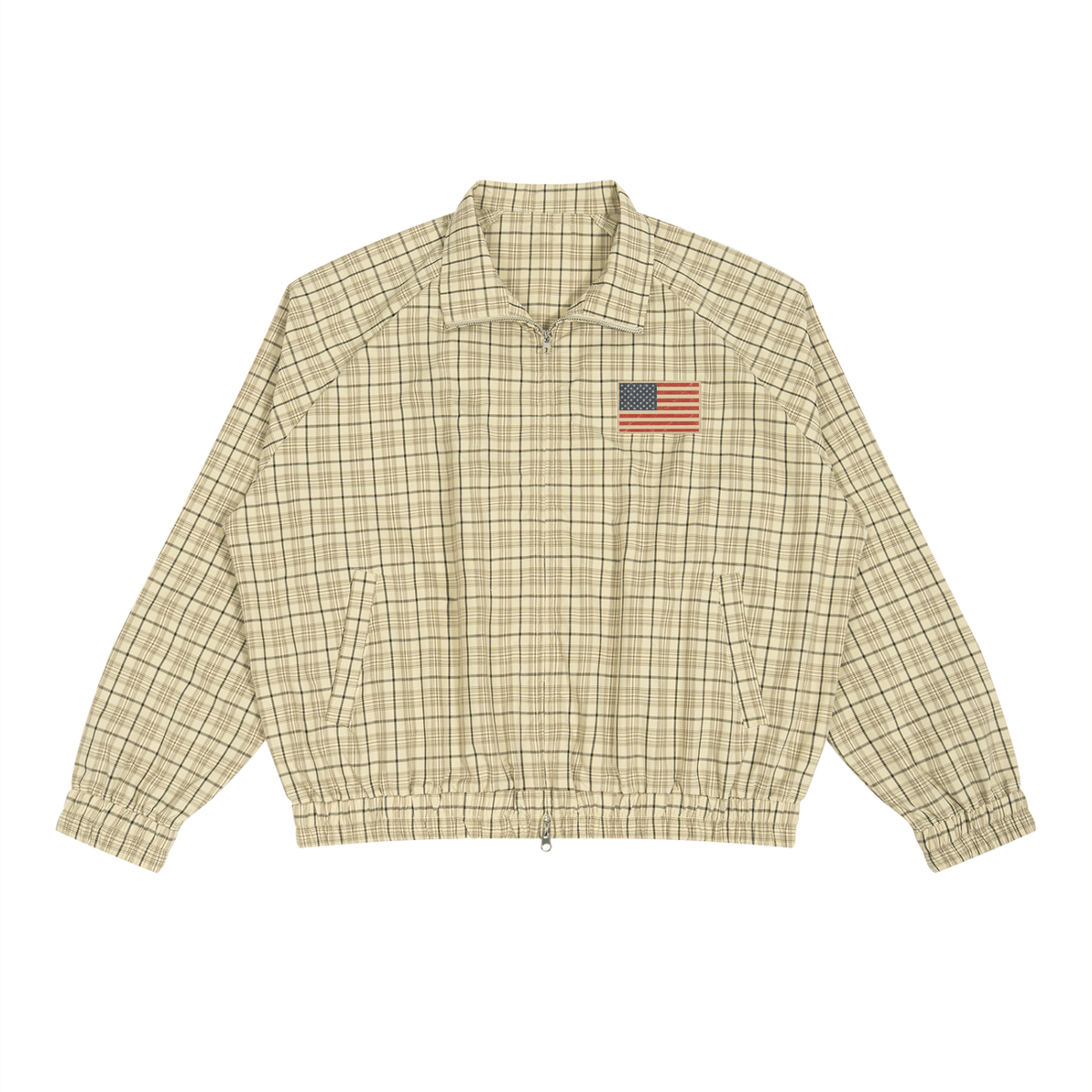 Apricot Check Harrington jacket with a small faded American flag badge on the chest