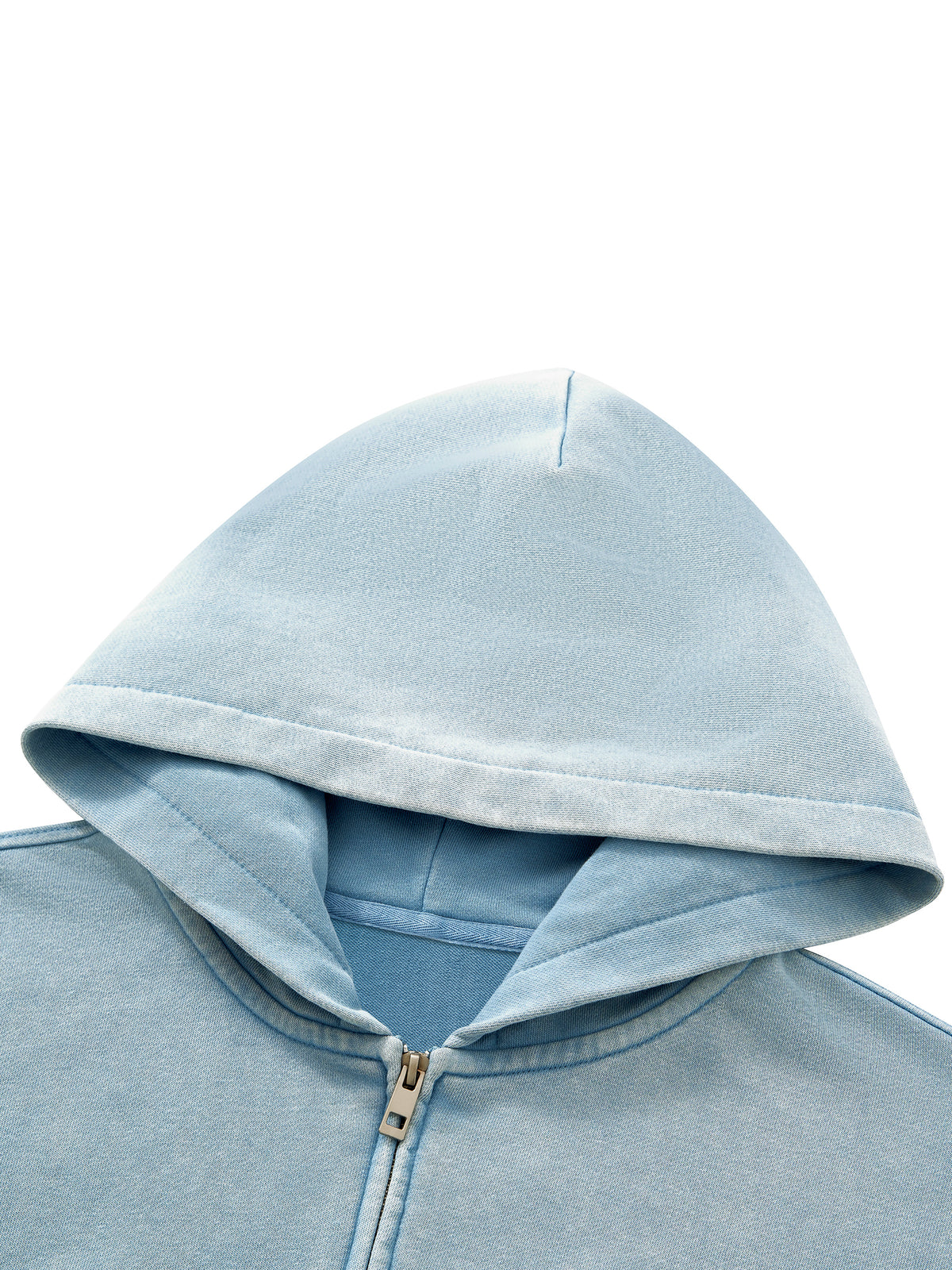 Close-up of the hood and zip in Haze Blue mineral wash fabric